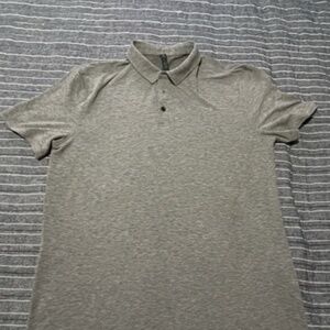 Lululemon Polo never worn to small. Tags were removed unfortunately. Size XL